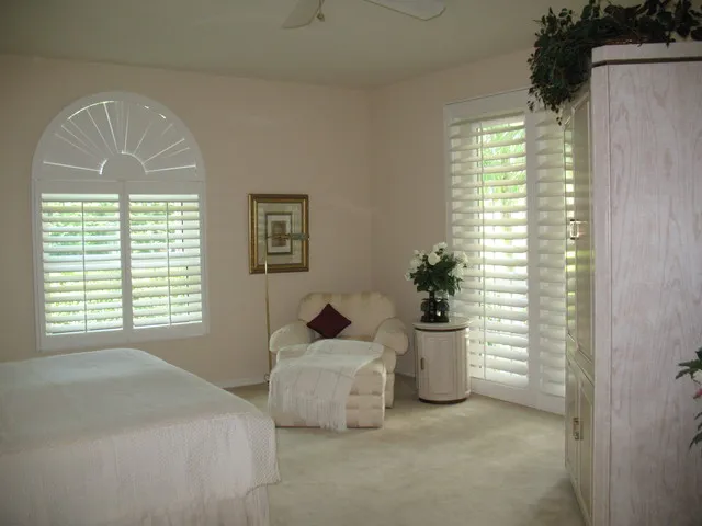 Master bedroom sitting area with french doors out to verandah