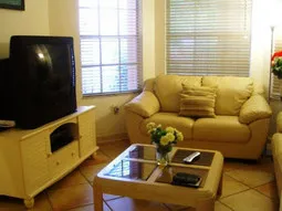 villa den-cozy, comfortable room, opens up to entire 1st 
floor.