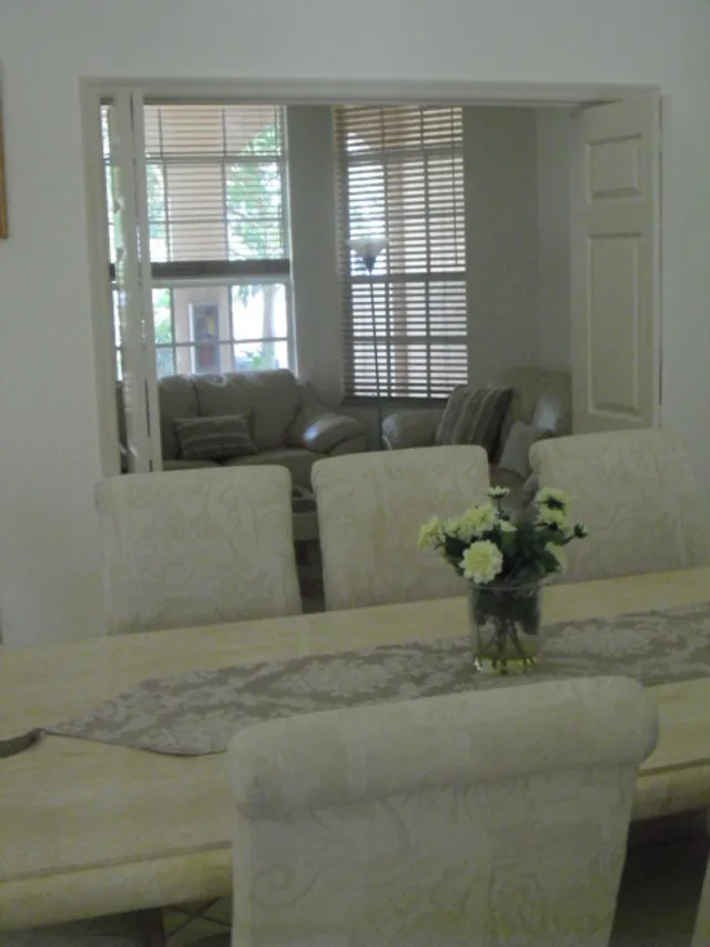 Standing in dining area looking towards den.