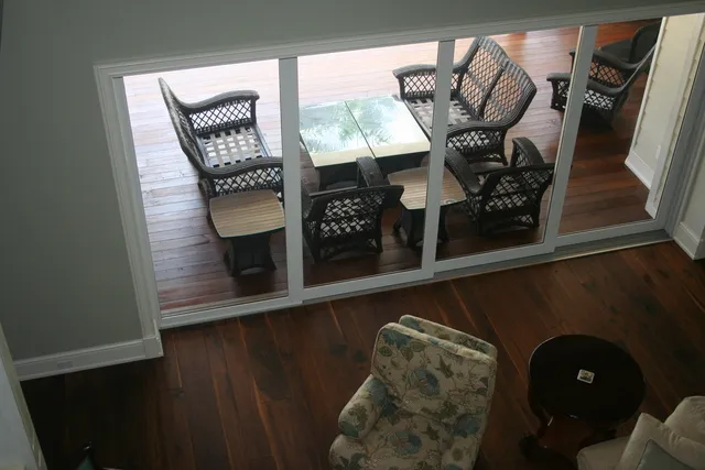 View from upper level of Great Room, looking down to main floor and lanai.