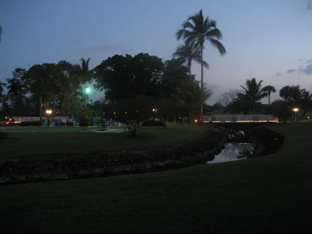 The pool area and Chikee bar at night