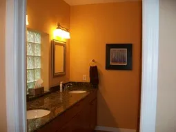 Gorgeous master bath has double sinks/granite counters & large tiled shower