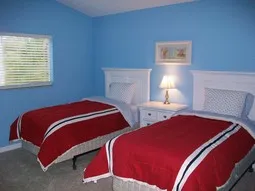 Third bedroom on 2nd floor features charming nautical theme and twin beds