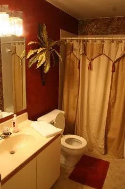 Beautiful guest bathroom with full tub and shower.
