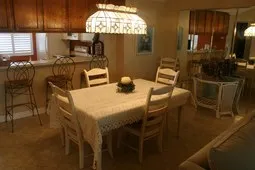 Spacious dining with table for six.