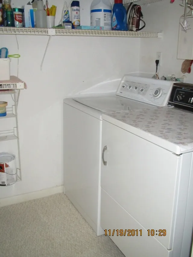Full size washer and dryer in laundry room