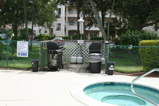 Barbecue grills located next to clubhouse with full kitchen.