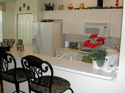 Kitchen with counter stools
