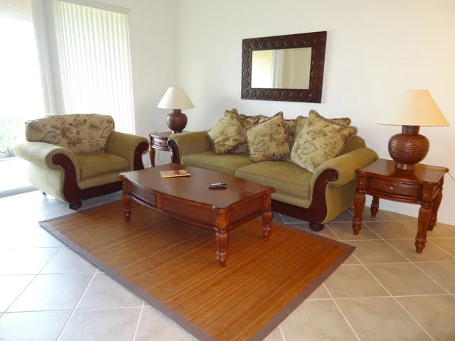 Confortable living area with lovely views of lake and golf course