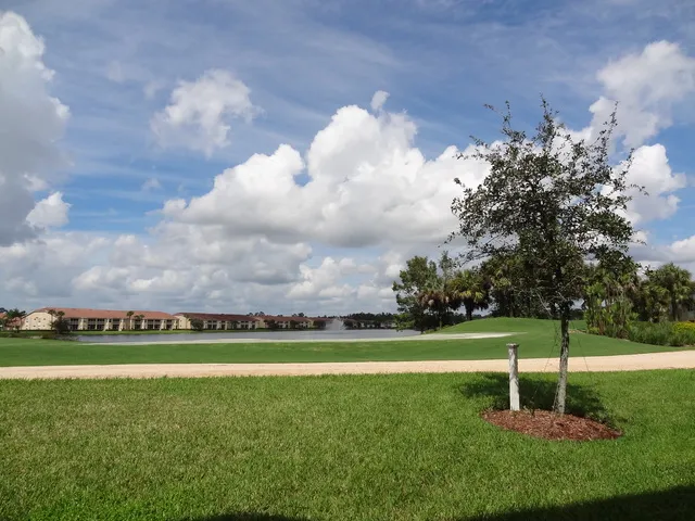 Lovely lake and golf course view from lanai of this fabulous 1st floor cond
