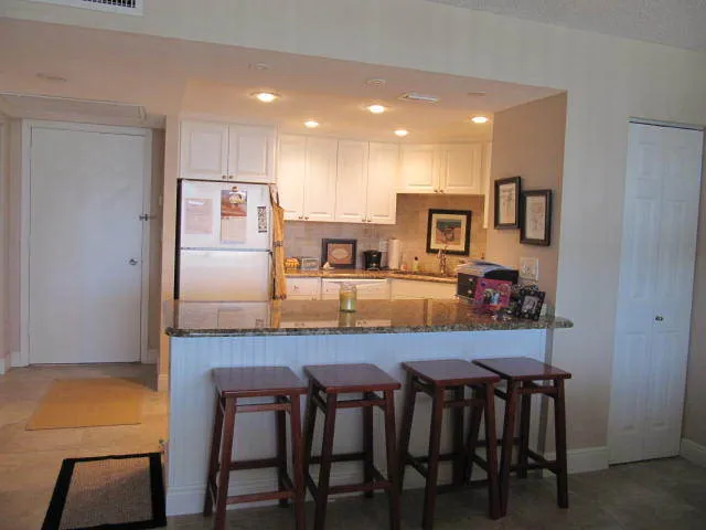 Granite Countertop with stools to eat at the bar if you like