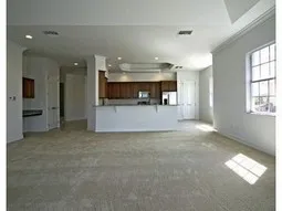 Living Room & Kitchen view from screened in porch