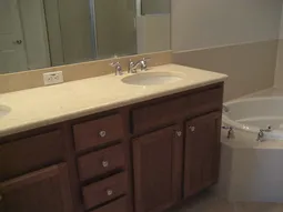 close up of master kitchen counter & jacuzzi tub
