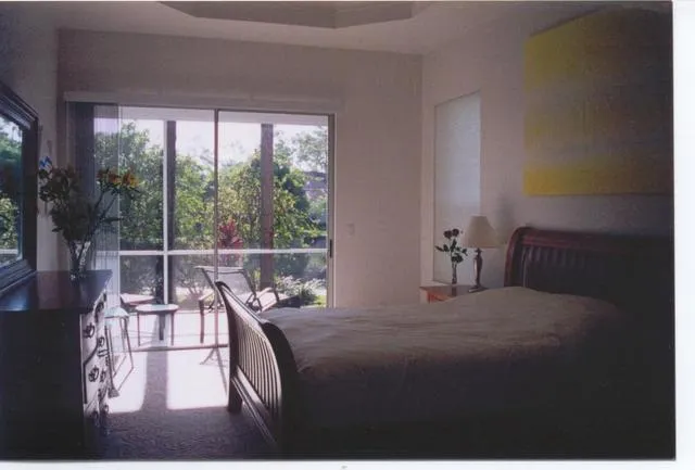 Master Bedroom with view to Lanai and Lake