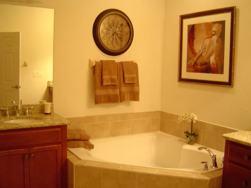 Master bathroom with double vanities and garden tub