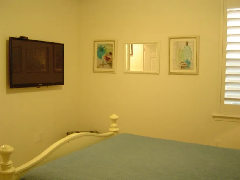 Flat screen TV in guest bedroom