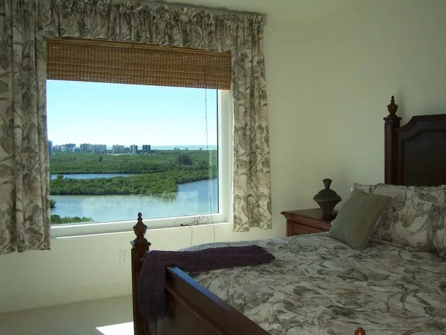 MASTER BEDROOM WITH GREAT WATER VIEW.