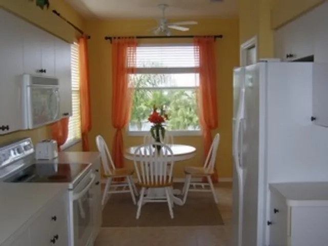 Eat in Kitchen with nice view and light and bright area.