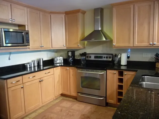 Beautiful renovated kicthen with granite countertops & stainless appliances