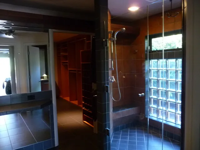 Master bath with huge glass walk-in shower.