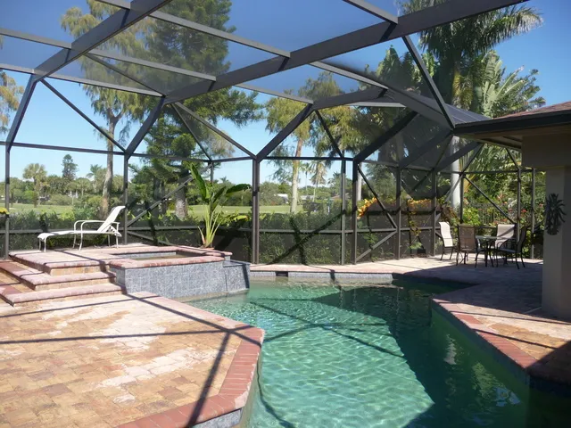 Beautiful free form pool with hot tub/spa.