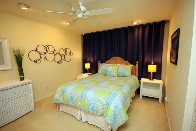 Guest Bedroom features a queen size bed.