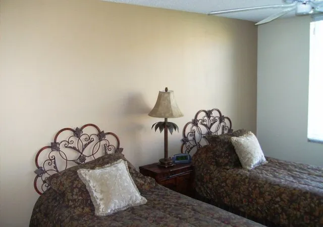 Guest Bedroom with two twins that can be converted to a King Bed.