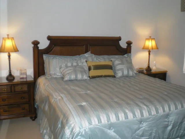 New king-size bed in master bedroom with double-sink master bath, walk-in c
