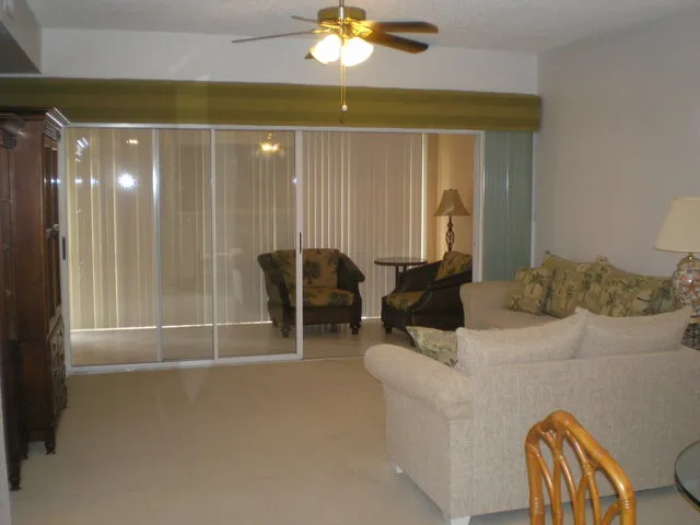 Spacious living area with queen-size pull-out couch with new TV and DVD/VCR