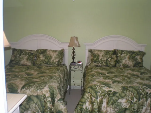 Two full-size beds make this guest room inviting.