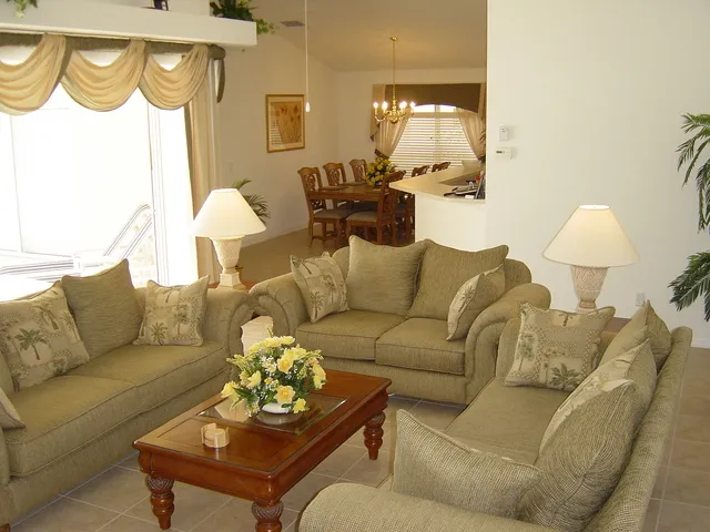 Beautiful living area looking towards the kitchen and formal dining area.
