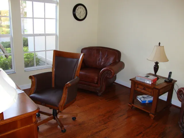 Separate den with oak floor, leather, computer, hi speed WiFi broadband