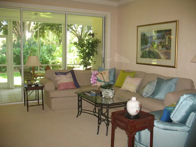 Nicely furnished, very comfortable living area with sliders out to lanai.